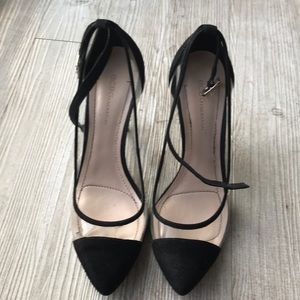 BCBGeneration black suede heels w clear design.